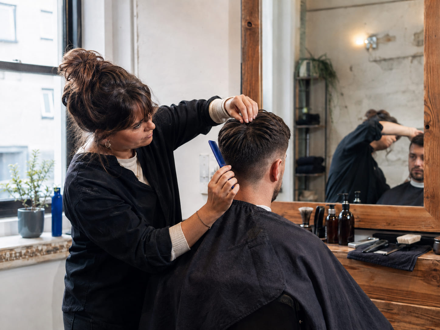 A barber at work in an independent shop