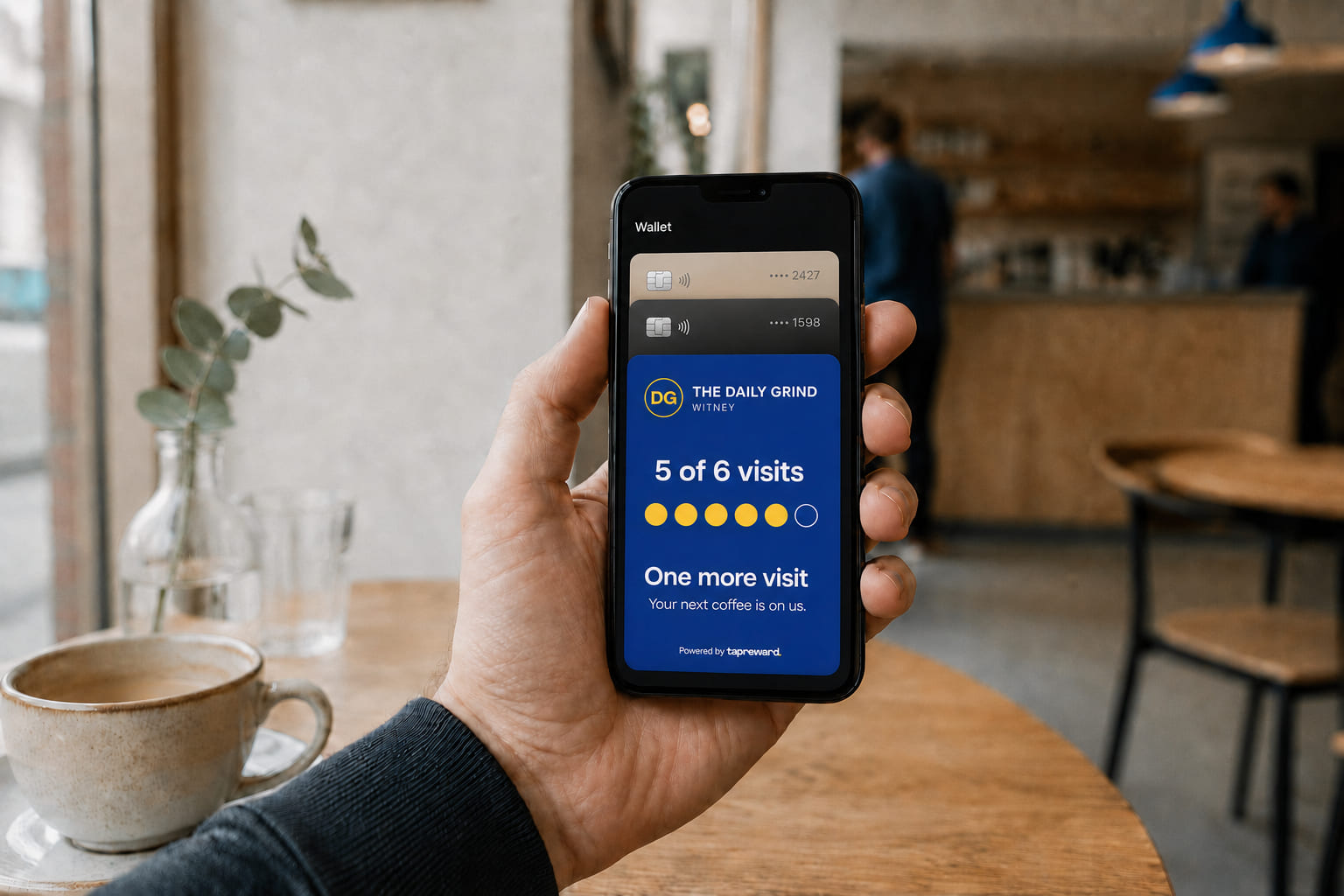 A TapReward loyalty card saved in Apple Wallet on a customer phone